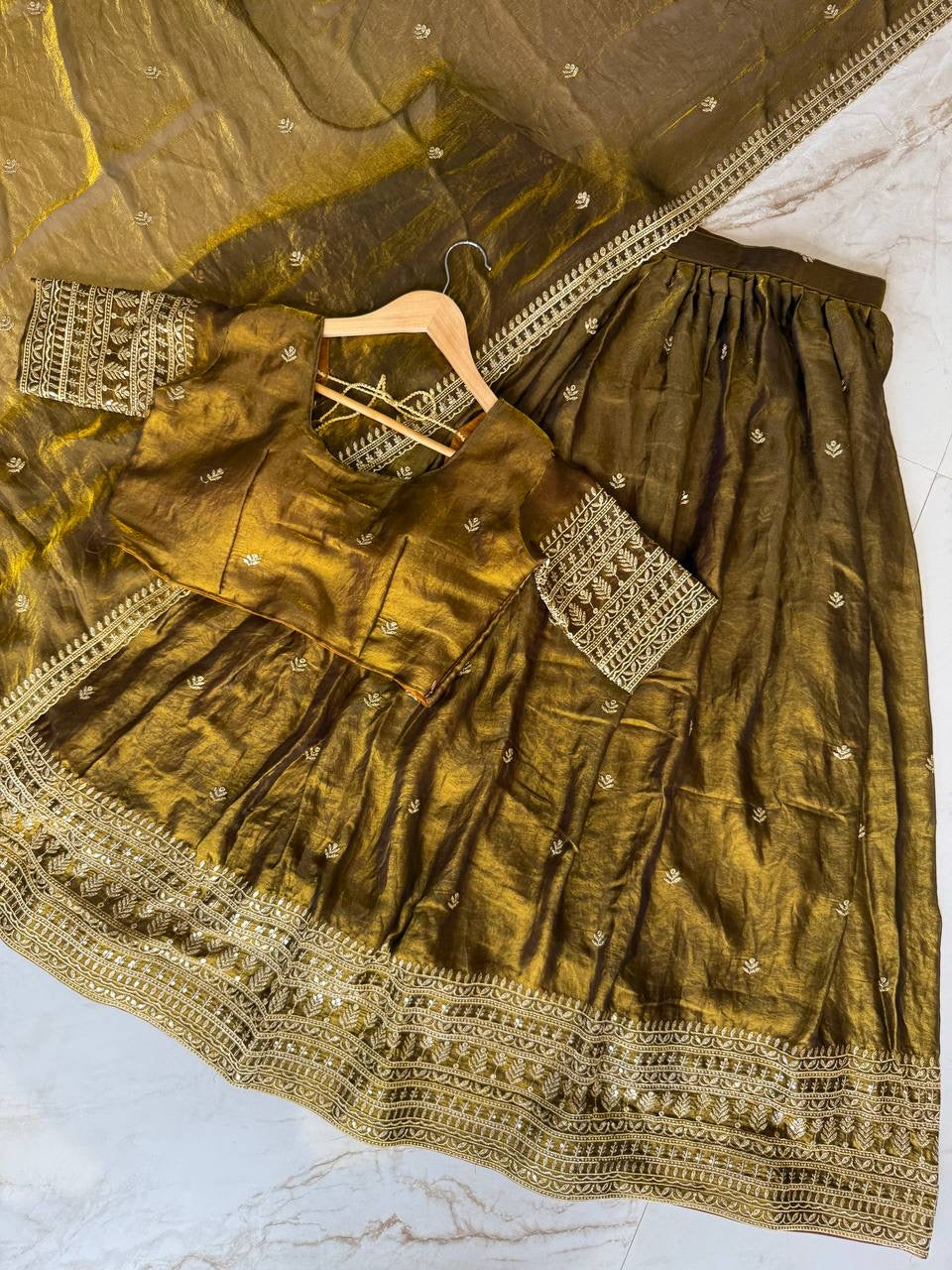 Shivtraa Designs Pvt Ltd has launched a new Tissue Silk Half Saree lehenga Choli in South Indian style