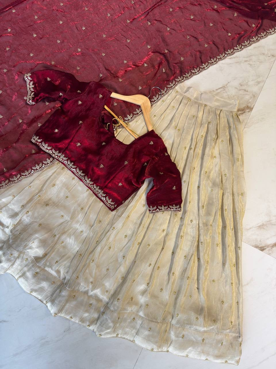 Shivtraa Designs Pvt Ltd has launched a new Tissue Silk Half Saree lehenga Choli in South Indian style