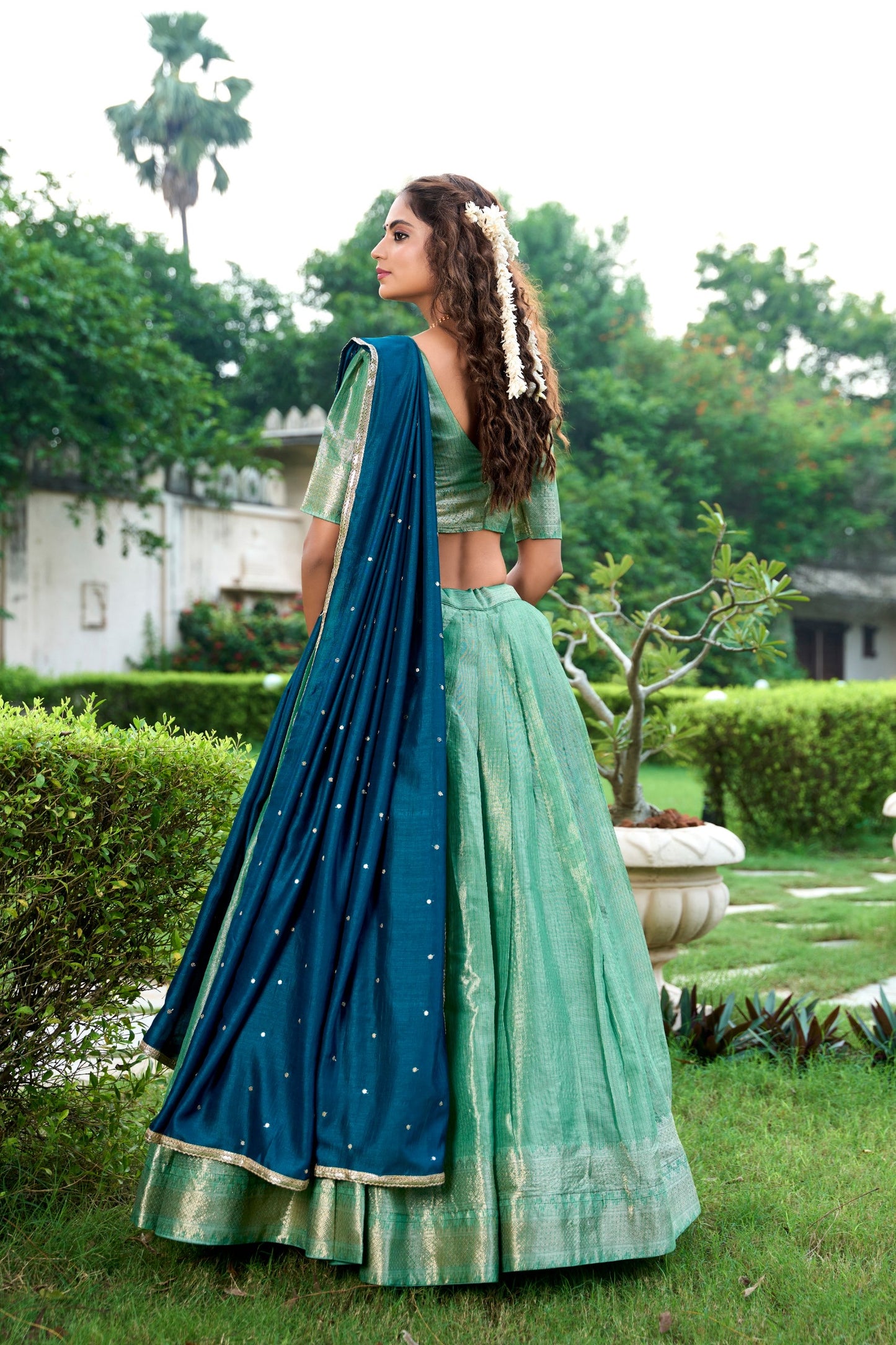 Introducing the exquisite Shivtraa Lehenga Collection, featuring the finest Kanchipuram weave beautifully styled for any festive occasion.