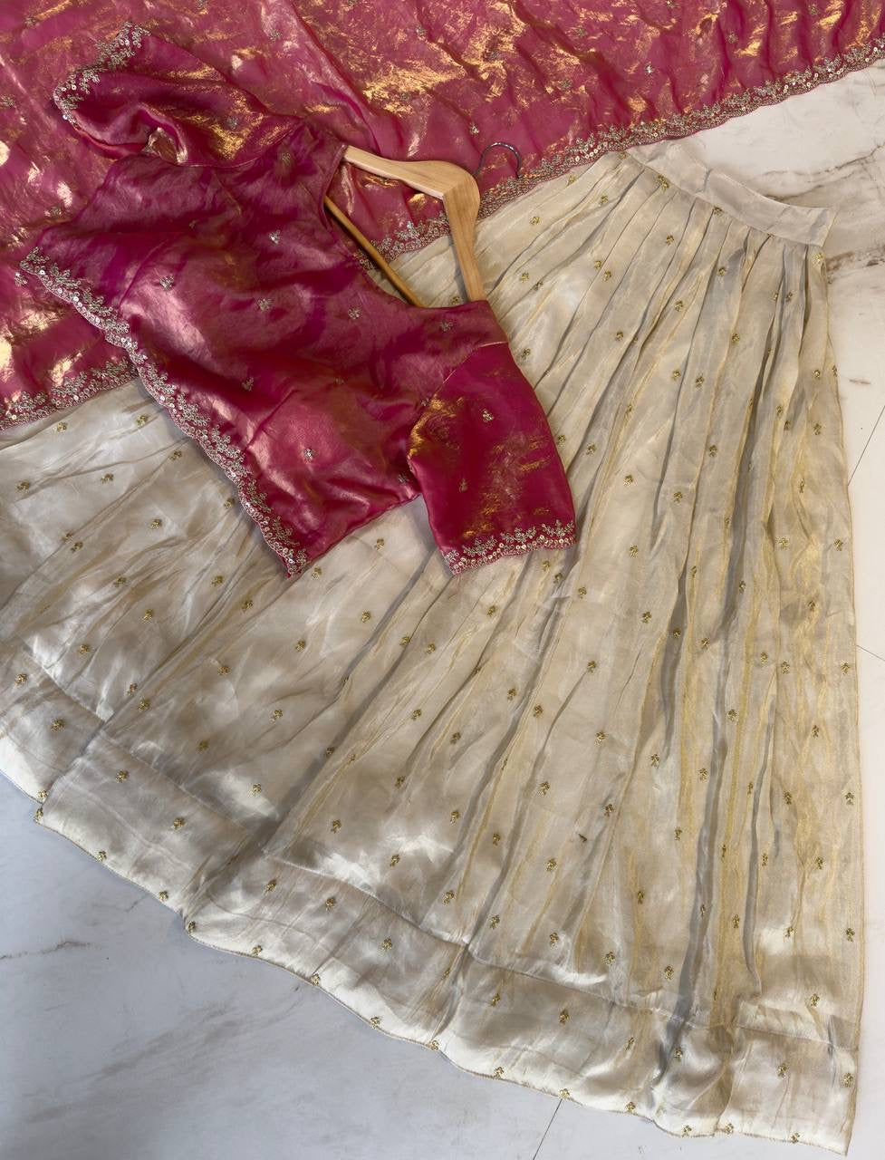 Shivtraa Designs Pvt Ltd has launched a new Tissue Silk Half Saree lehenga Choli in South Indian style