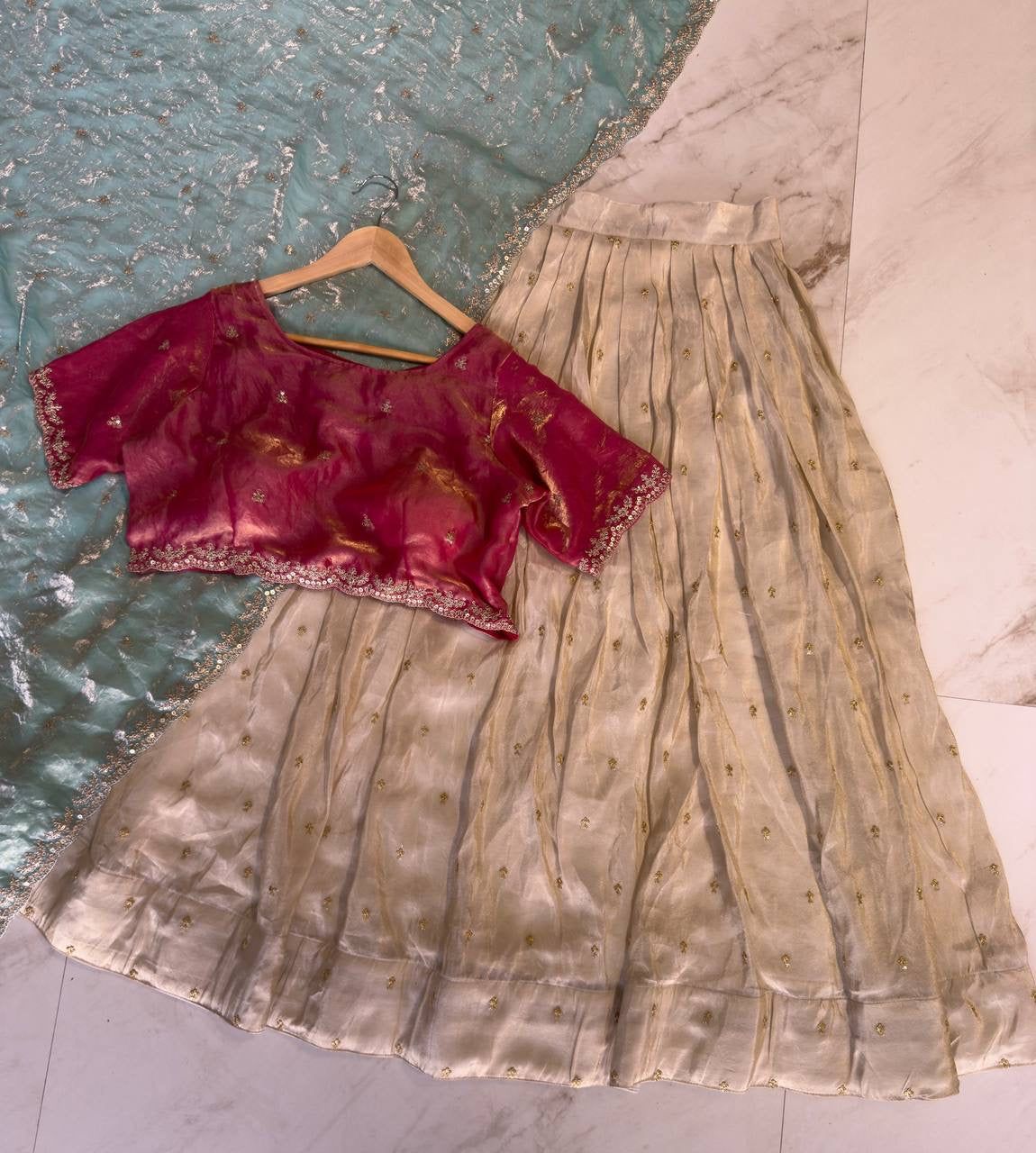 Shivtraa Designs Pvt Ltd has launched a new Tissue Silk Half Saree lehenga Choli in South Indian style