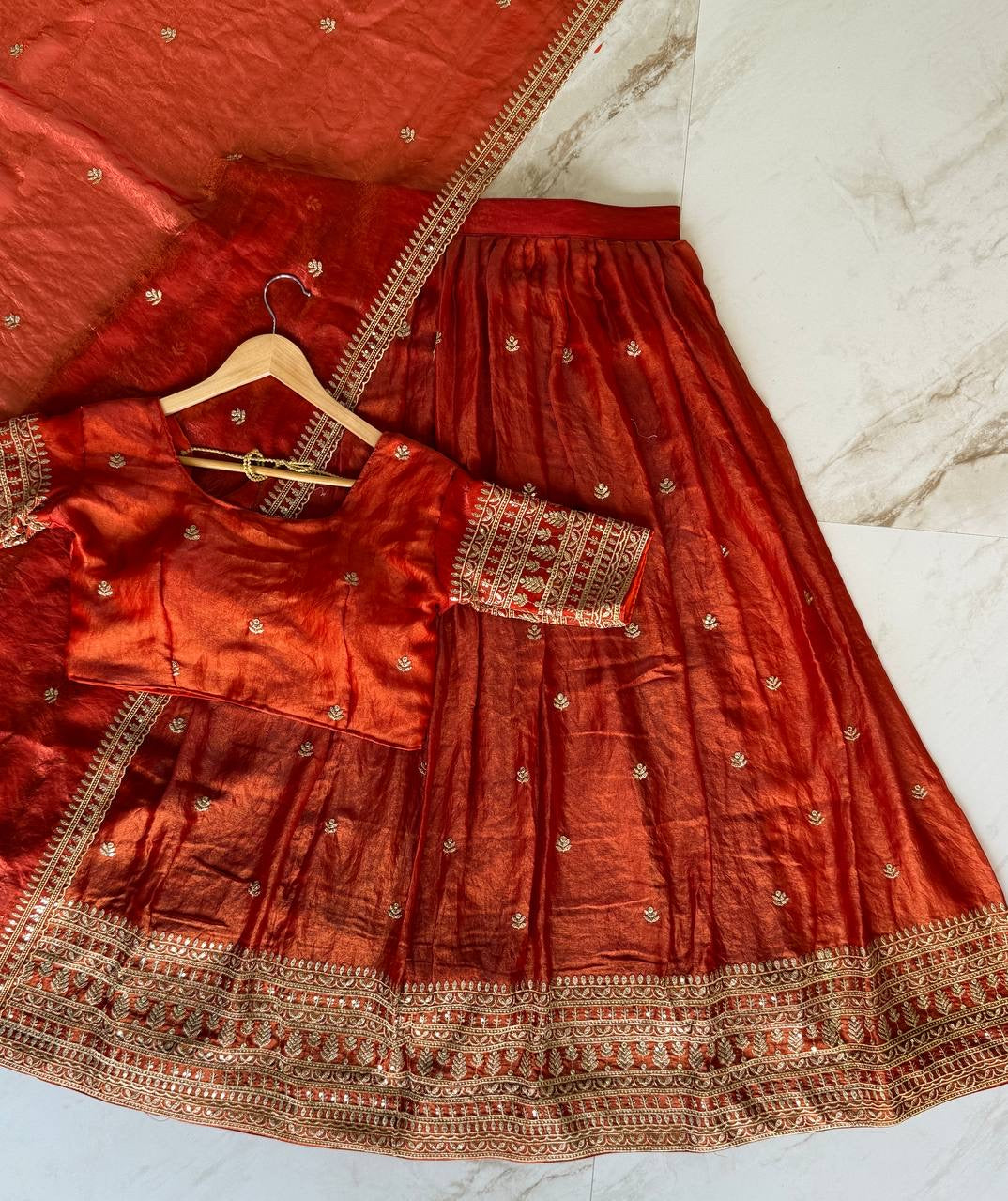 Shivtraa Designs Pvt Ltd has launched a new Tissue Silk Half Saree lehenga Choli in South Indian style