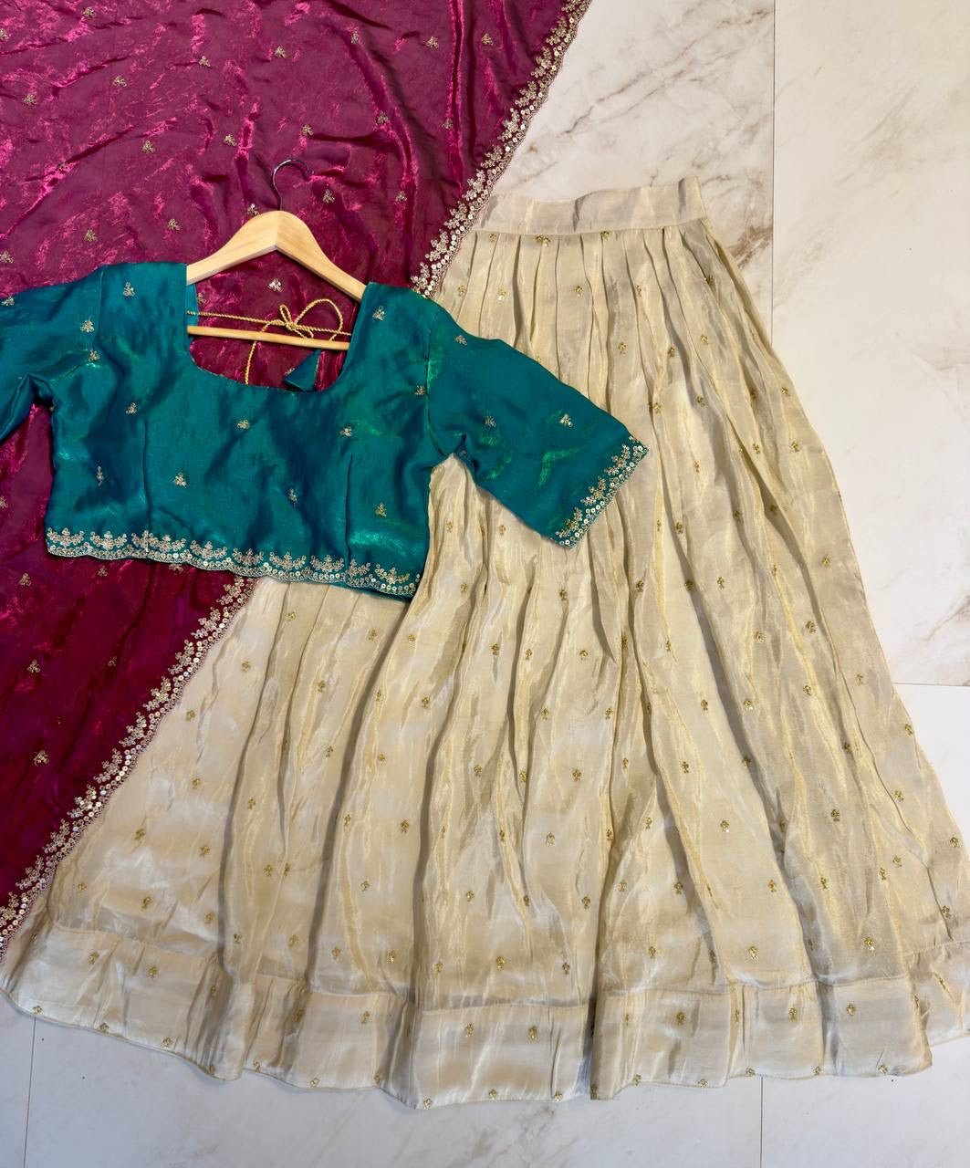 Shivtraa Designs Pvt Ltd has launched a new Tissue Silk Half Saree lehenga Choli in South Indian style