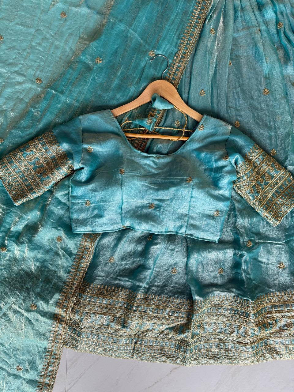Shivtraa Designs Pvt Ltd has launched a new Tissue Silk Half Saree lehenga Choli in South Indian style