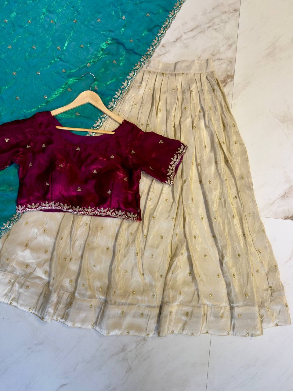 Shivtraa Designs Pvt Ltd has launched a new Tissue Silk Half Saree lehenga Choli in South Indian style