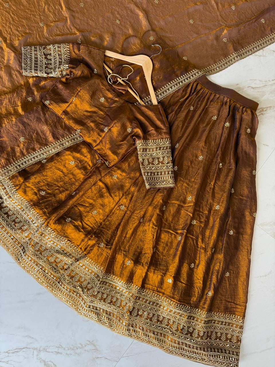 Shivtraa Designs Pvt Ltd has launched a new Tissue Silk Half Saree lehenga Choli in South Indian style