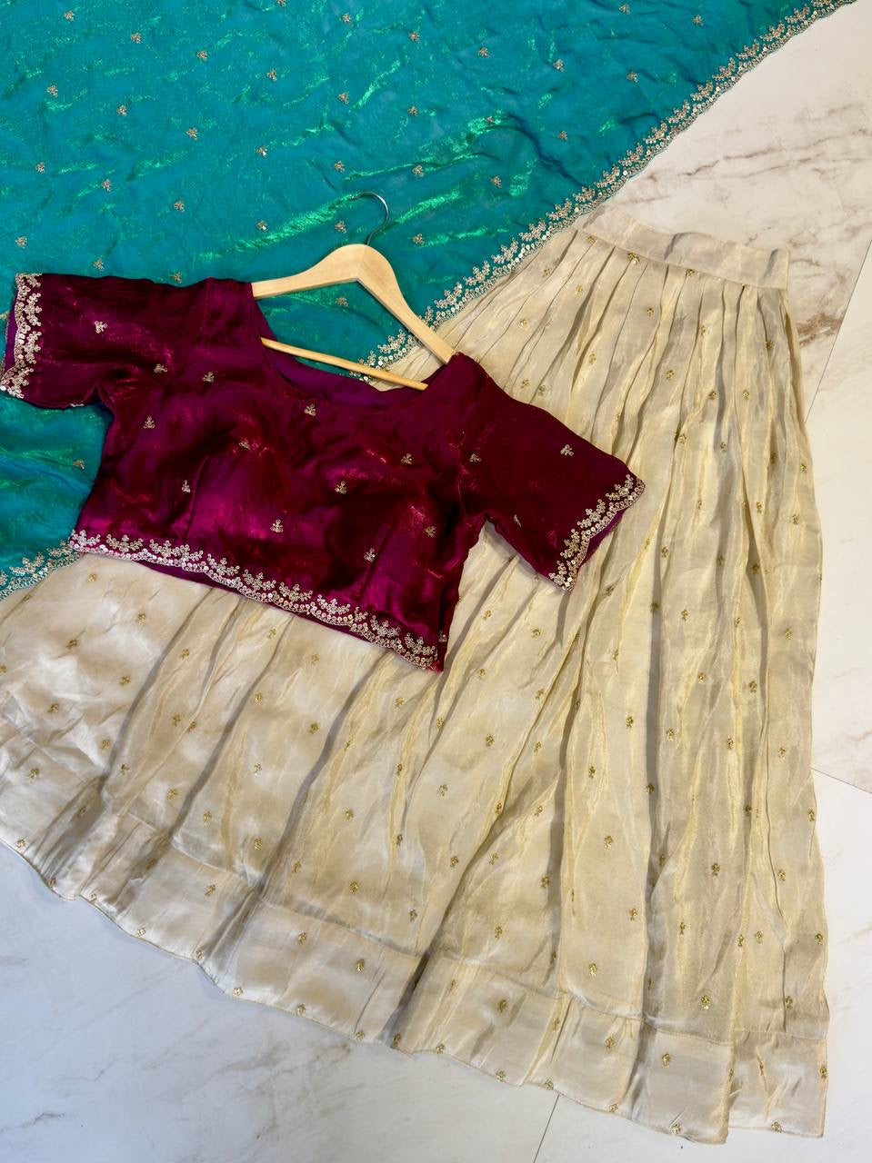 Shivtraa Designs Pvt Ltd has launched a new Tissue Silk Half Saree lehenga Choli in South Indian style