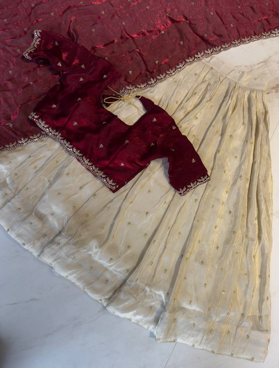 Shivtraa Designs Pvt Ltd has launched a new Tissue Silk Half Saree lehenga Choli in South Indian style
