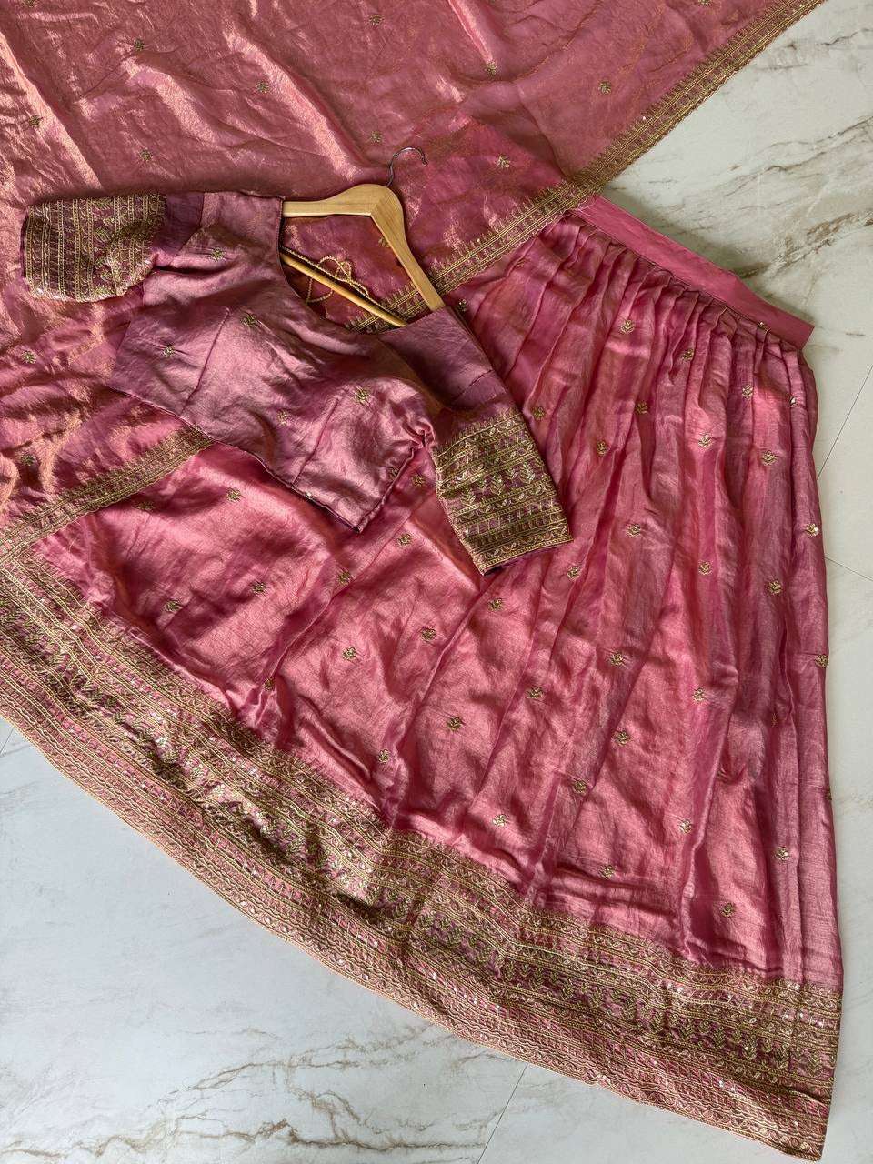 Shivtraa Designs Pvt Ltd has launched a new Tissue Silk Half Saree lehenga Choli in South Indian style