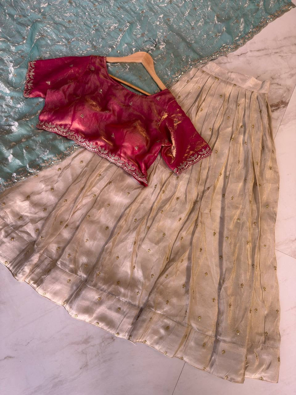 Shivtraa Designs Pvt Ltd has launched a new Tissue Silk Half Saree lehenga Choli in South Indian style