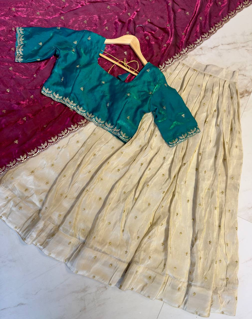 Shivtraa Designs Pvt Ltd has launched a new Tissue Silk Half Saree lehenga Choli in South Indian style