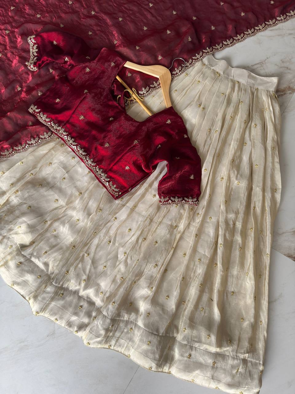 Shivtraa Designs Pvt Ltd has launched a new Tissue Silk Half Saree lehenga Choli in South Indian style