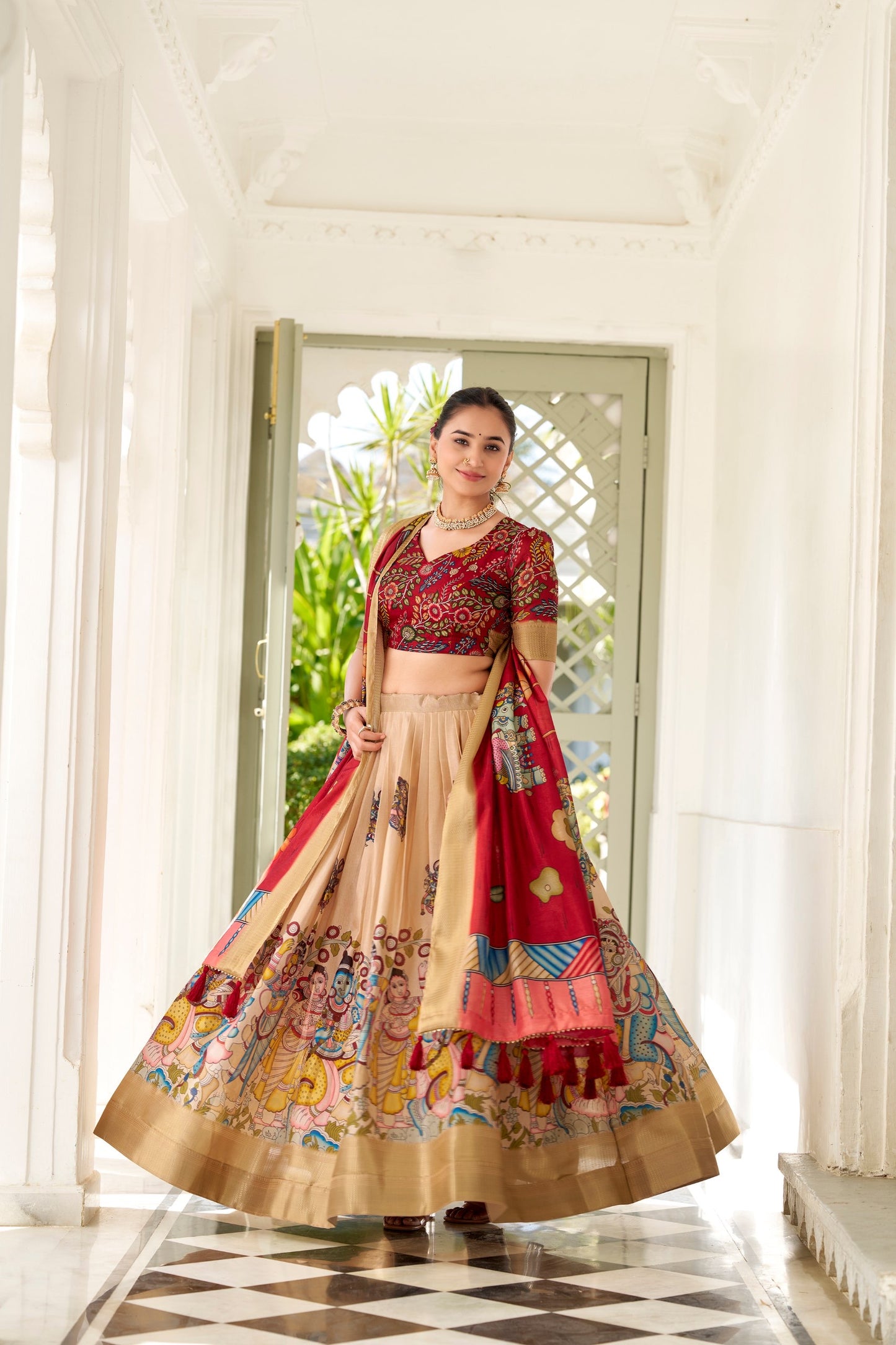 ✨ Adorned in the elegance of Dola Silk and the intricate charm of Kalamkari prints, this lehenga choli whispers tales of tradition and beauty. 💐