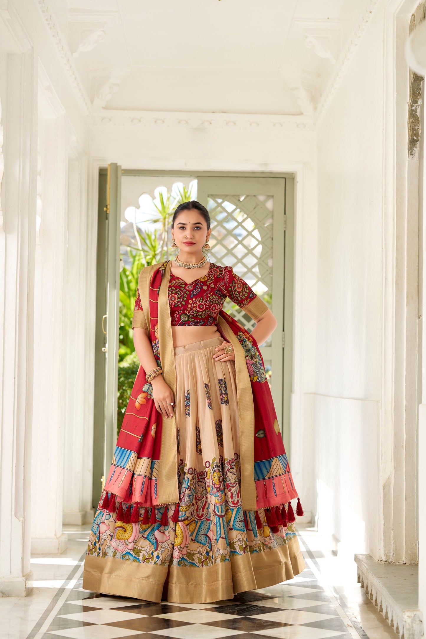 ✨ Adorned in the elegance of Dola Silk and the intricate charm of Kalamkari prints, this lehenga choli whispers tales of tradition and beauty. 💐